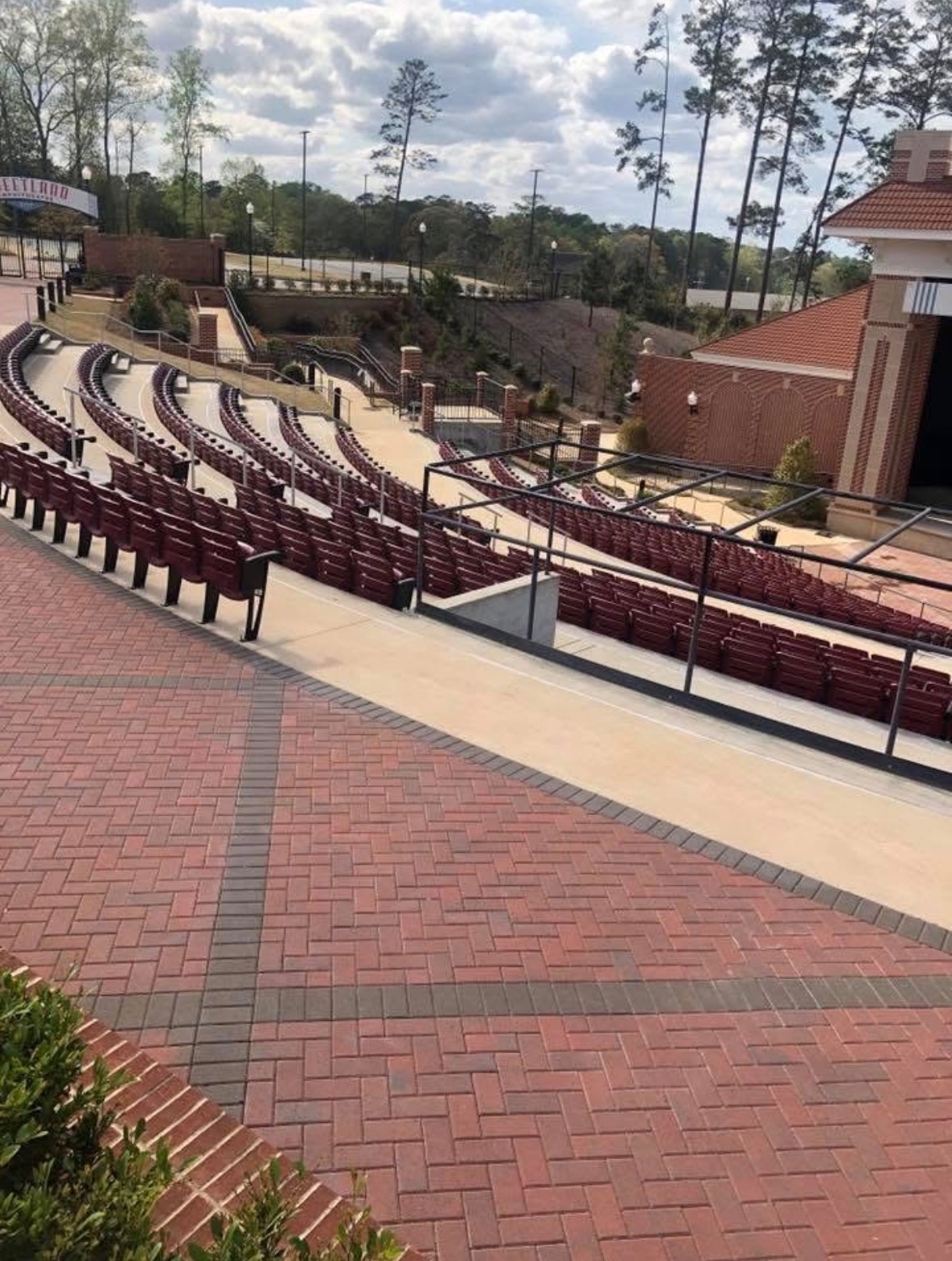 Large outdoor amphitheater seating and venue surfaces serviced by Southern Style Soft Wash